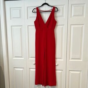 Wayf Red Sleeveless Jumpsuit with Deep V-Neckline
